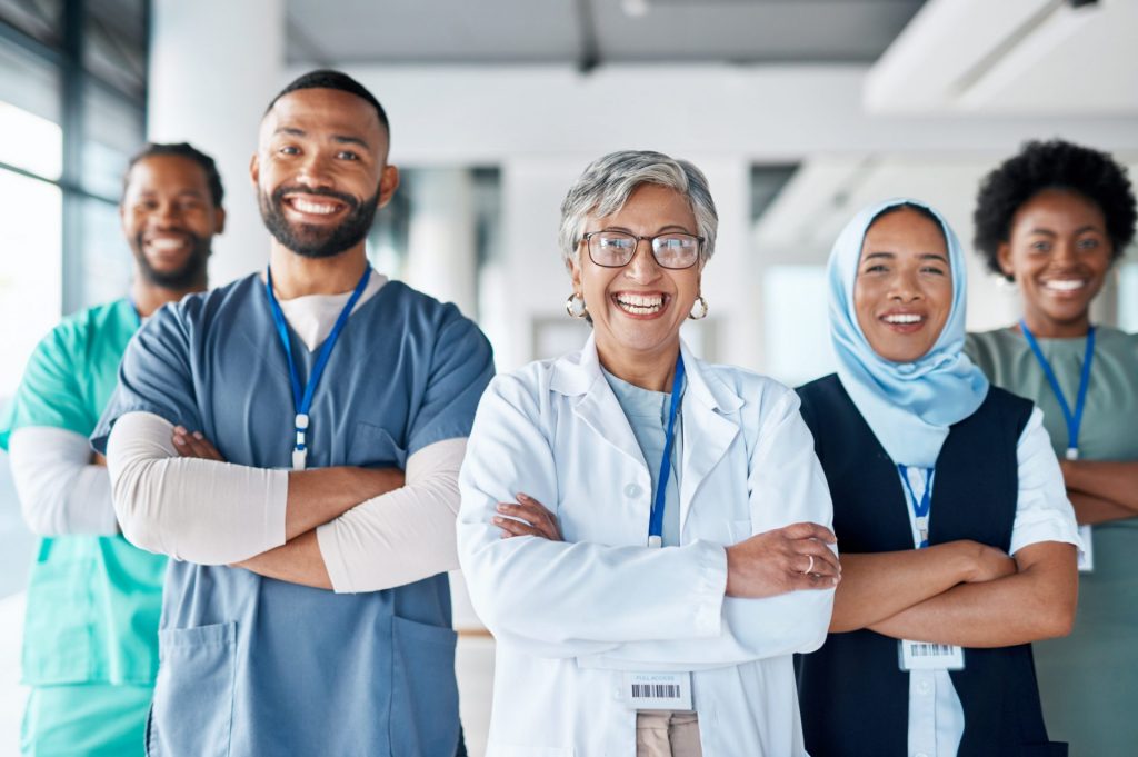 happy health system hospital employees after a successful EHR implementation