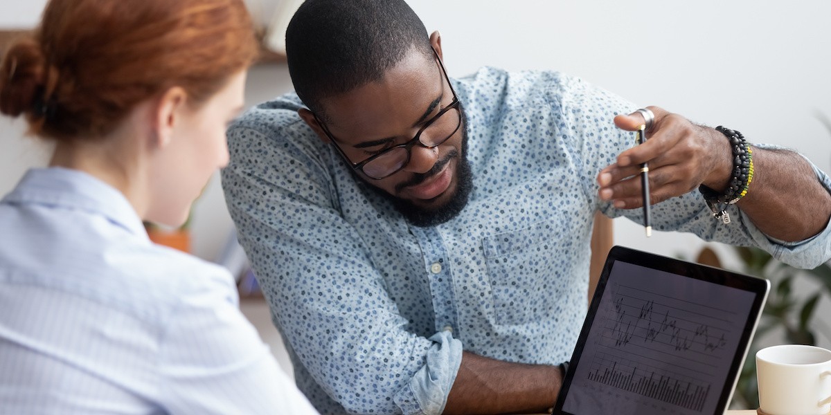 healthcare business staff reviewing revenue cycle analytics